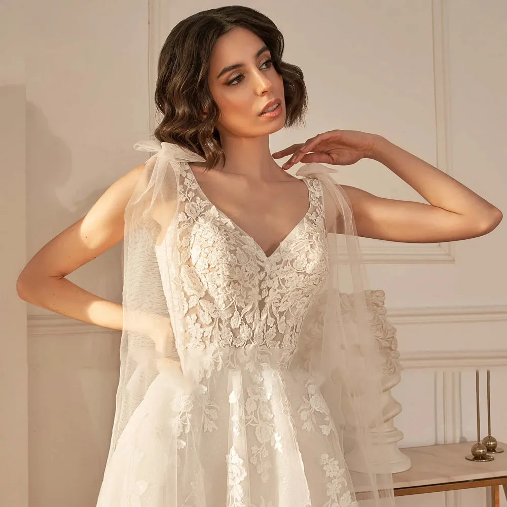 A-Line Sexy Backless V Neck Sleeveless Wedding Dress Luxury Spaghetti Straps Ribbons Sweep Train Bridal Gown