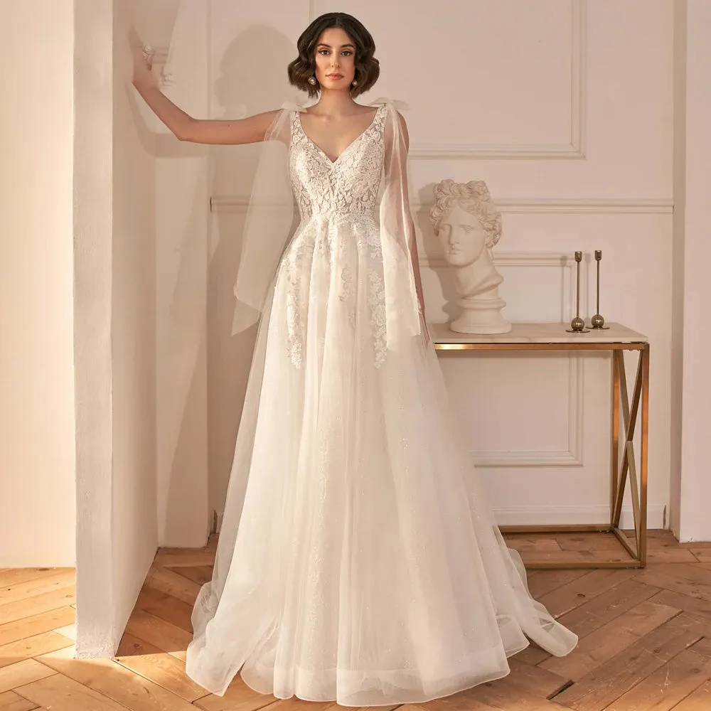 A-Line Sexy Backless V Neck Sleeveless Wedding Dress Luxury Spaghetti Straps Ribbons Sweep Train Bridal Gown