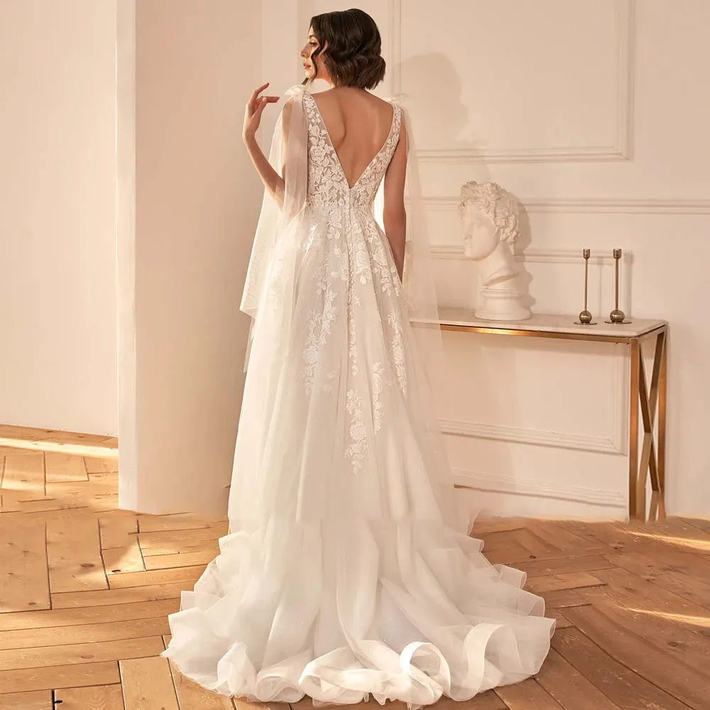 A-Line Sexy Backless V Neck Sleeveless Wedding Dress Luxury Spaghetti Straps Ribbons Sweep Train Bridal Gown