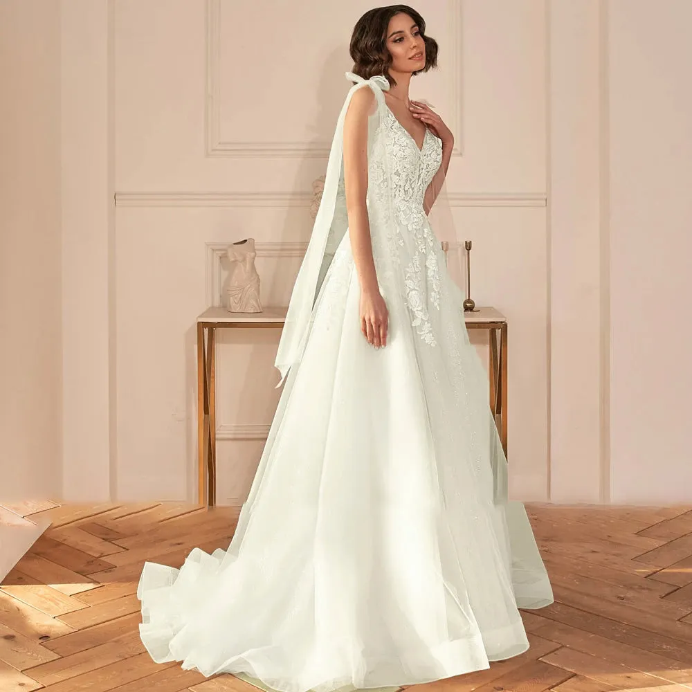 A-Line Sexy Backless V Neck Sleeveless Wedding Dress Luxury Spaghetti Straps Ribbons Sweep Train Bridal Gown